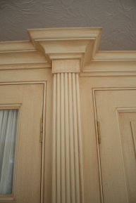 Detail of the wardrobe reeded pillasters